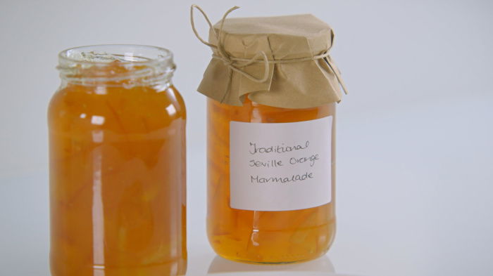 A picture of two jars of seville orange marmalade
