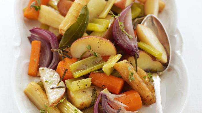 picture of Delia Smith recipe for baked vegetables in serving dish with serving spoon