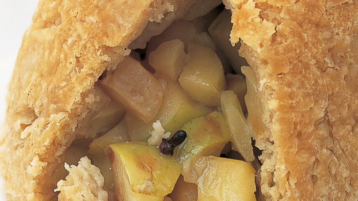 cooked suet pudding showing the apple filling