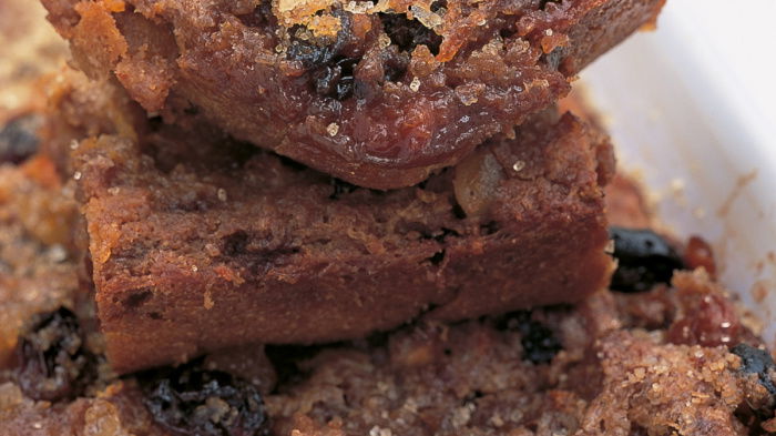 slices of cooked bread and butter pudding in a white bowl