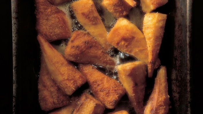 a picture of an oven tray of cooked parsnips