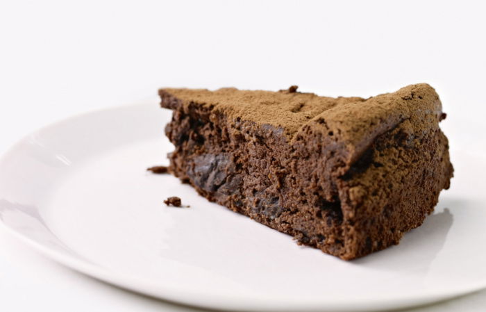 a picutre of a slice of chocolate cake on a white plate