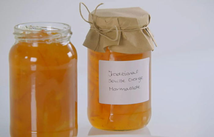 A picture of two jars of seville orange marmalade