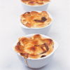 a picutre of three white bowls serving Delia Smith's recipe for individual steak mushroom and kidney pies