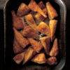 a picture of an oven tray of cooked parsnips