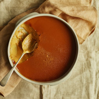 a bowl filled with burn't honey baked custard 