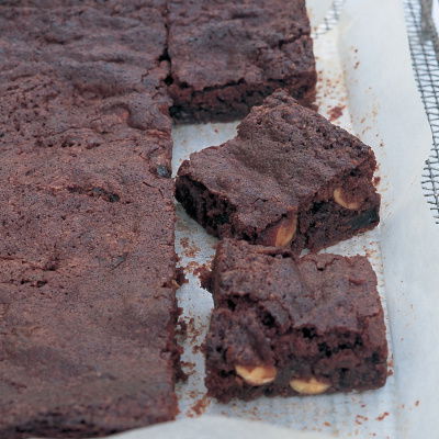 a picture of sliced brownies on a layer of greaseproof paper