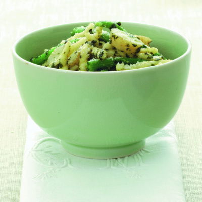 a picture of a bowl of trofie pasta with chopped potatoes and green beans